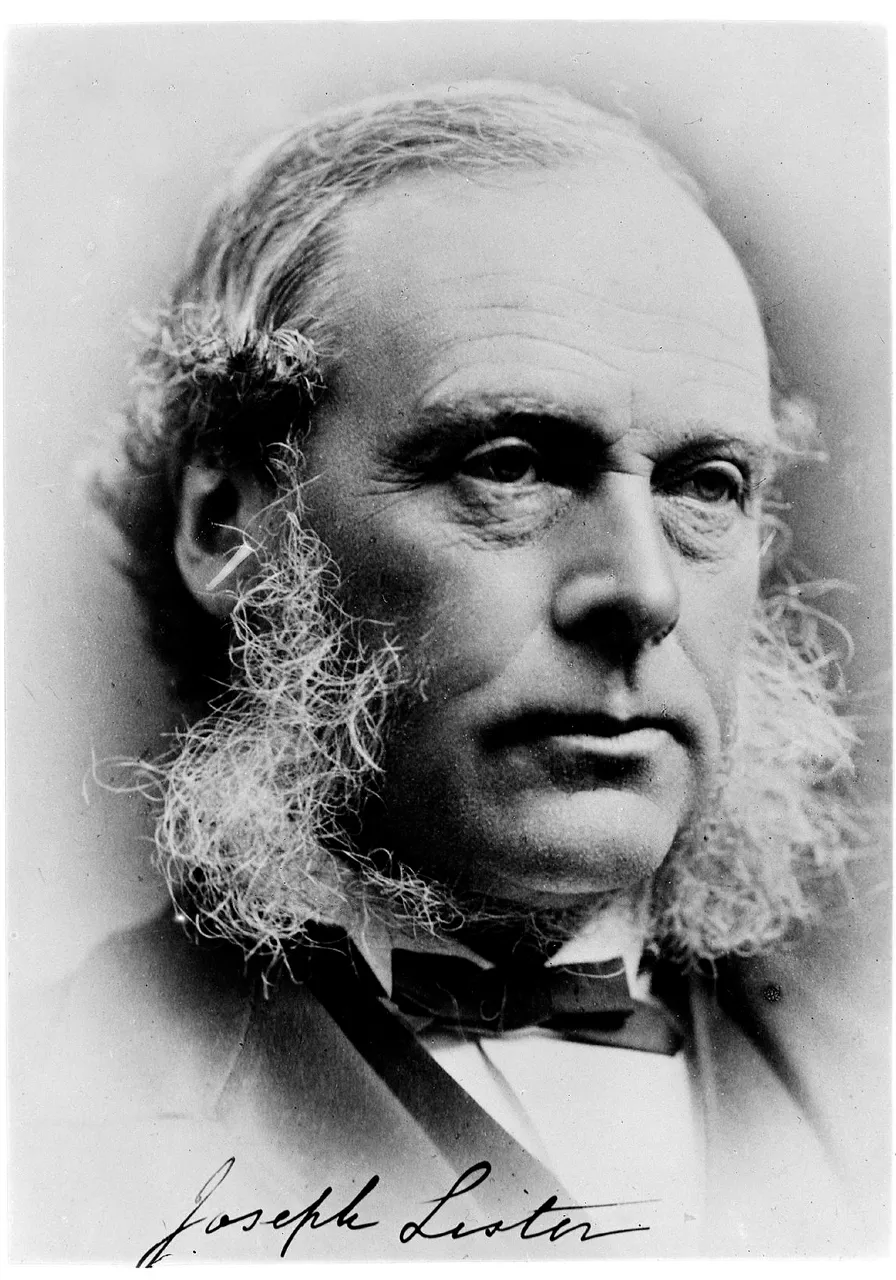 a black and white photo of a man with long hair a medical person ,inventor of antiseptic 