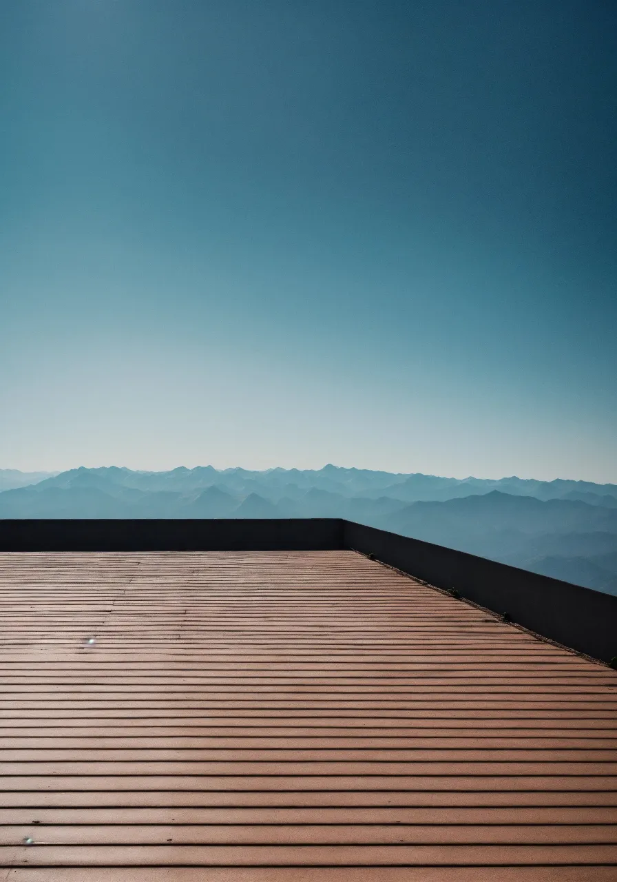 a view of mountains from the roof of a building