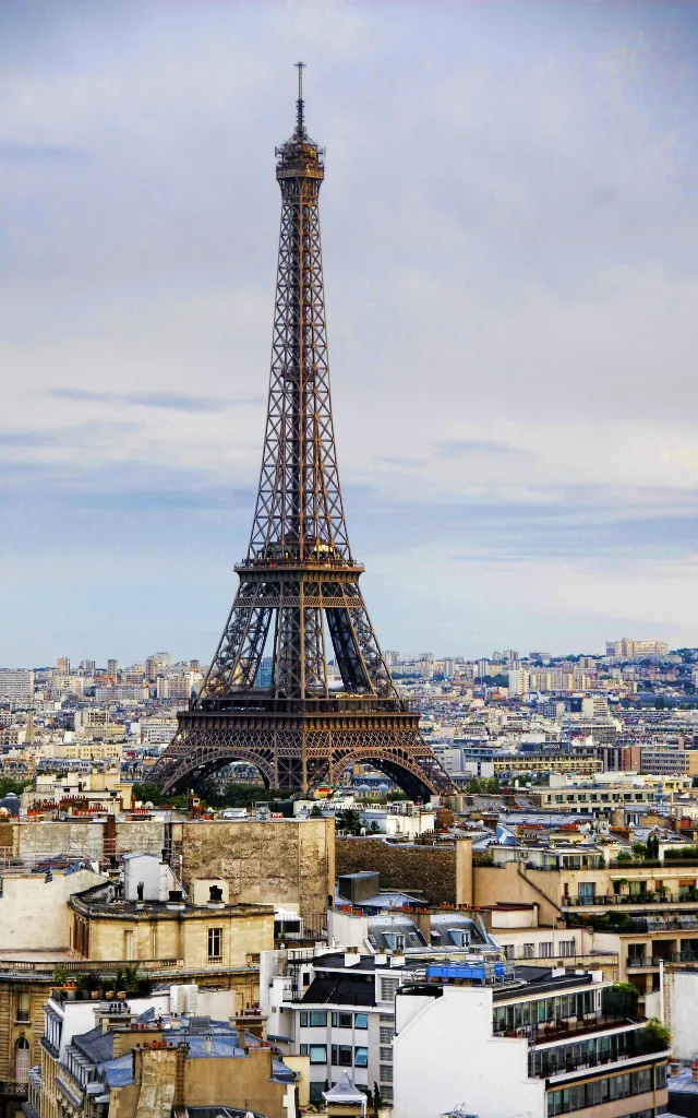 the eiffel tower towering over the city of paris