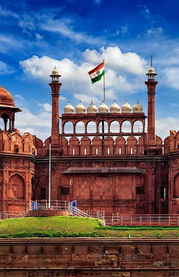 a large building with a flag on top of it