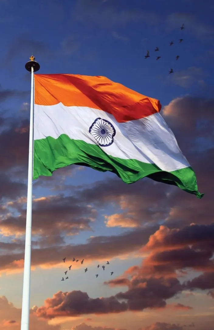 the indian flag is flying high in the sky