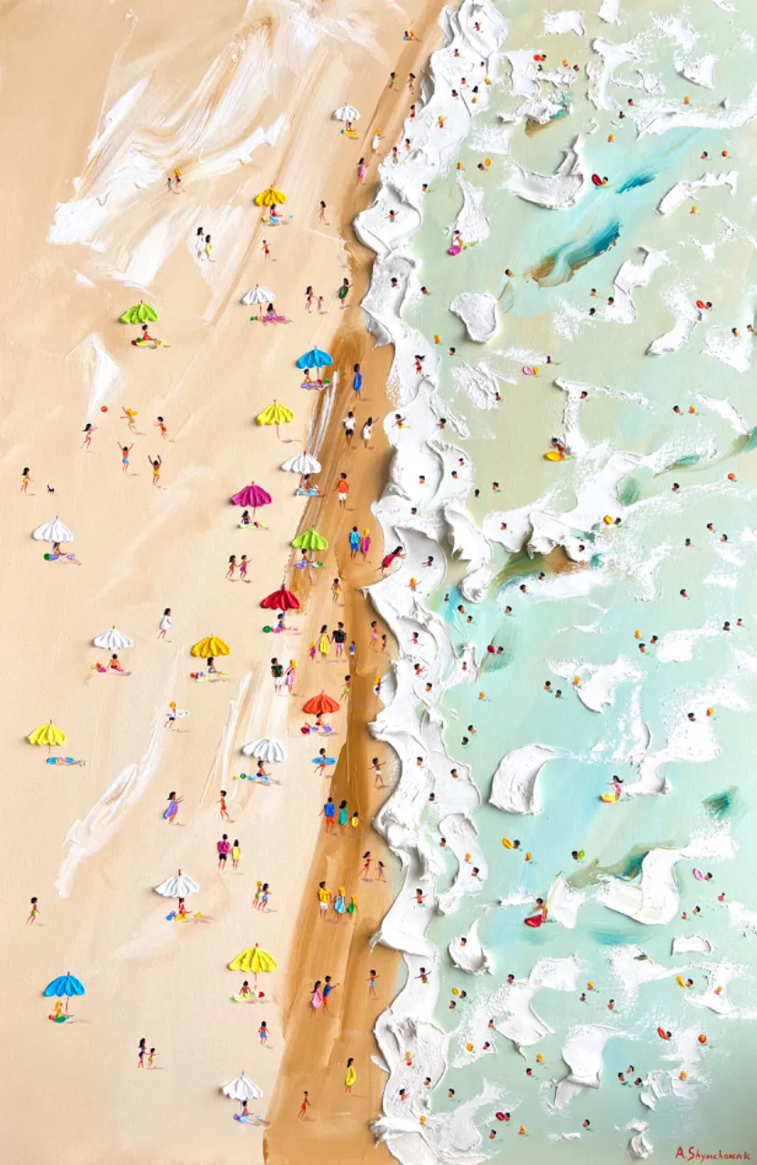 Beach umbrellas in bold primary colors, with a stark white sand background