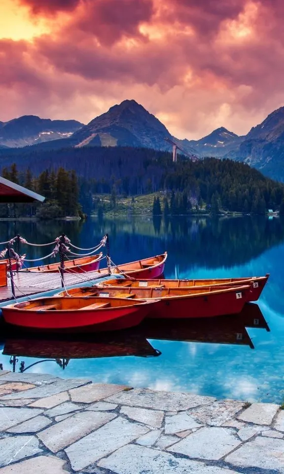 a couple of boats that are sitting in the water