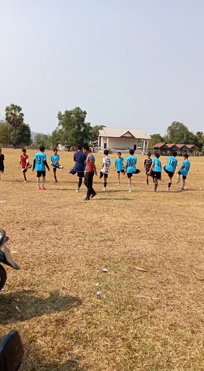 a group of young men playing a game of soccer