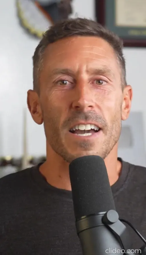 a man holding a microphone up to his face