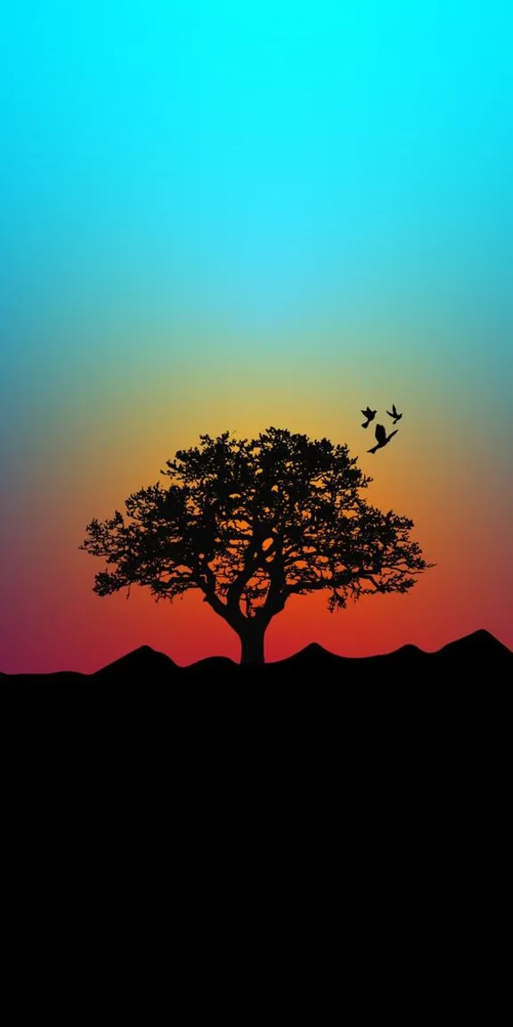 a tree with birds flying over it at sunset