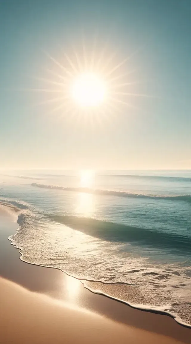 the sun is shining over the ocean on the beach