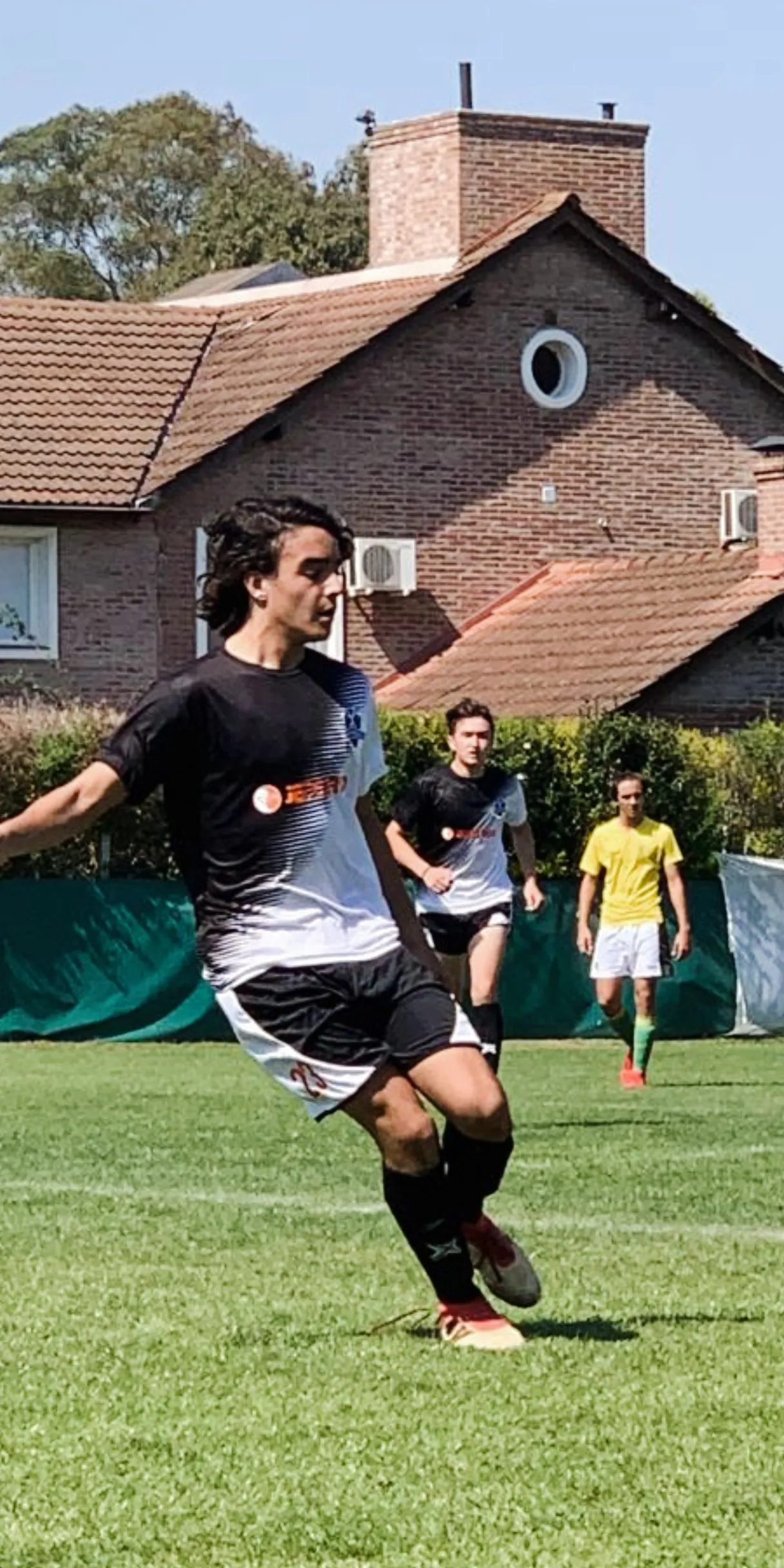 this soccer player doing a goal, advertising style