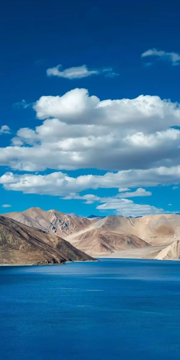 a large body of water surrounded by mountains