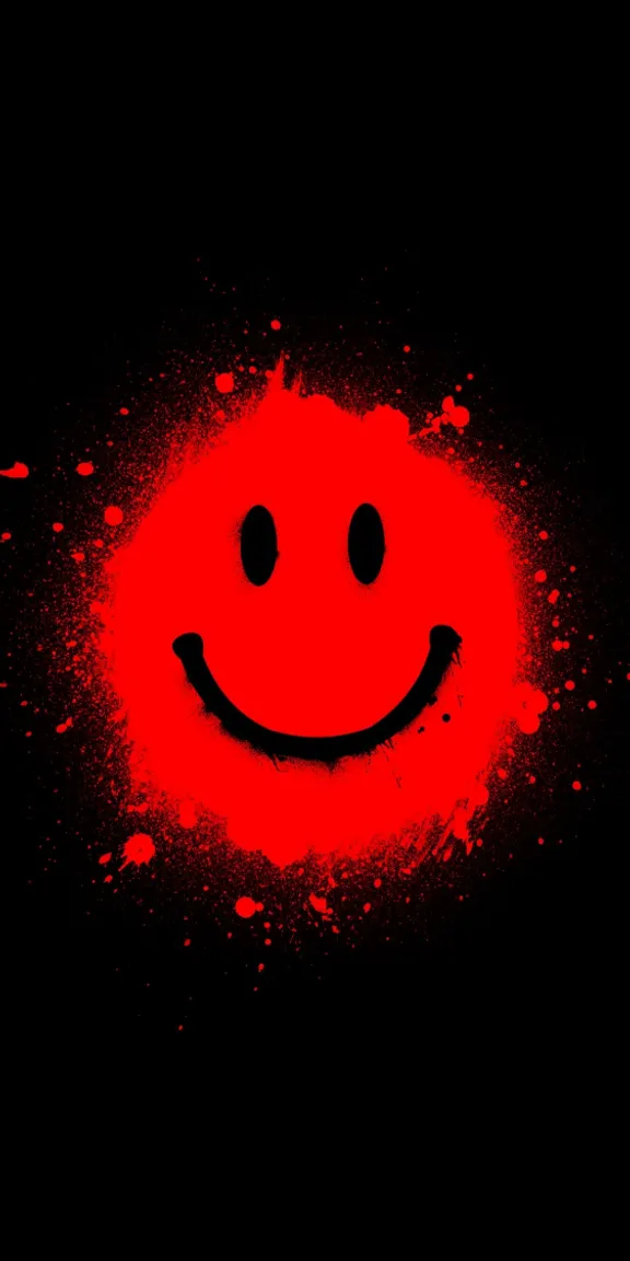 a red smiley face on a black background